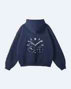 Navy blue Moon Tide Hoodie with a unique design on the back against a light gray background