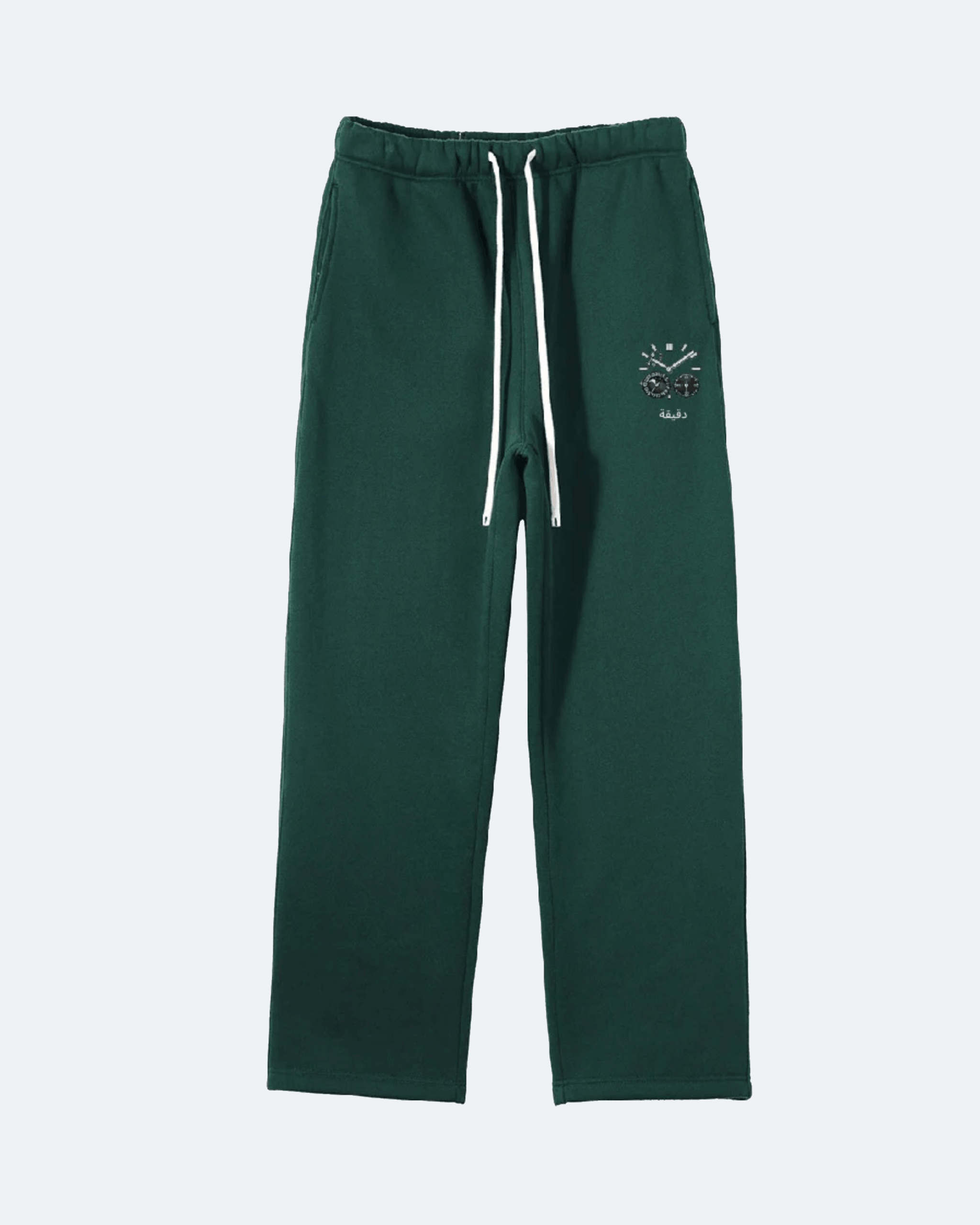 Green Moon Tide Sweatpants with a small logo on a white background
