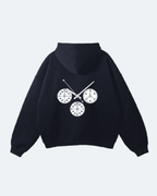 Black Newman Era Hoodie with white clock design on a light gray background