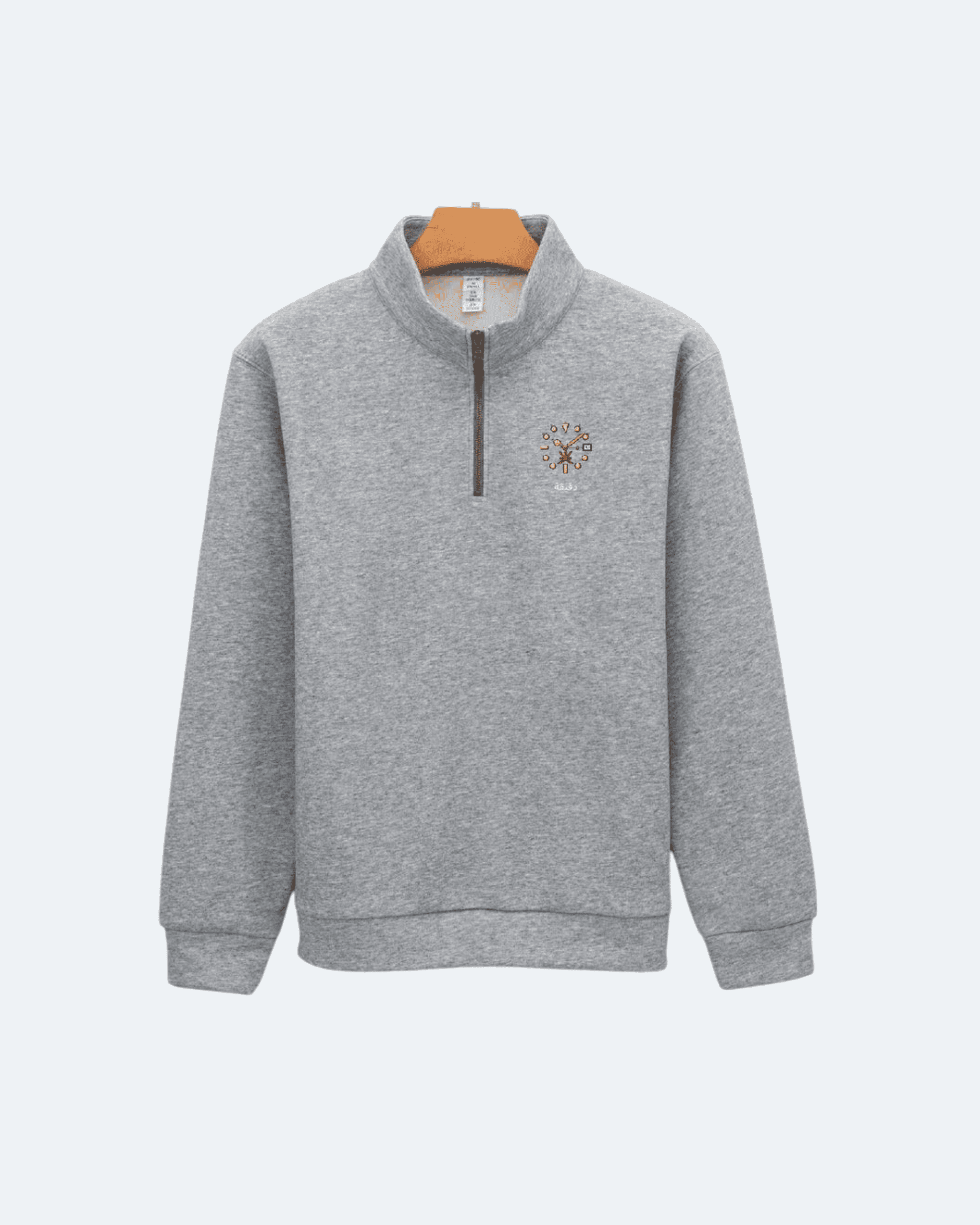 Gray Oman Edition Quarter Zip sweatshirt with a small logo on a white background