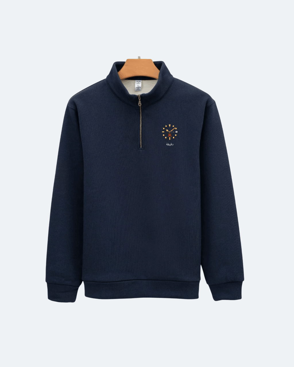 Navy blue Oman Edition Quarter Zip sweatshirt with a logo on a white background