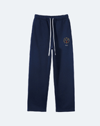 Navy blue sweatpants with a logo on a white background