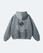 Gray Perpetual Flight Hoodie with clock designs on a light gray background