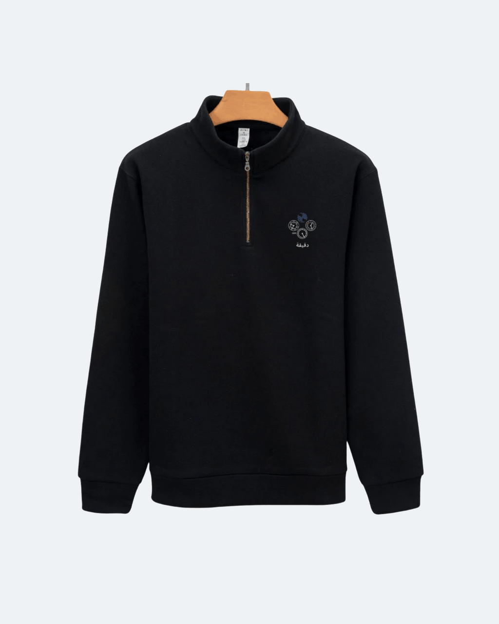 Black Perpetual Flight Quarter Zip with a logo on a white background