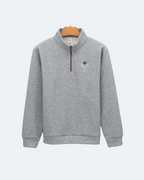 Gray Perpetual Flight Quarter Zip sweatshirt with a small logo on a white background