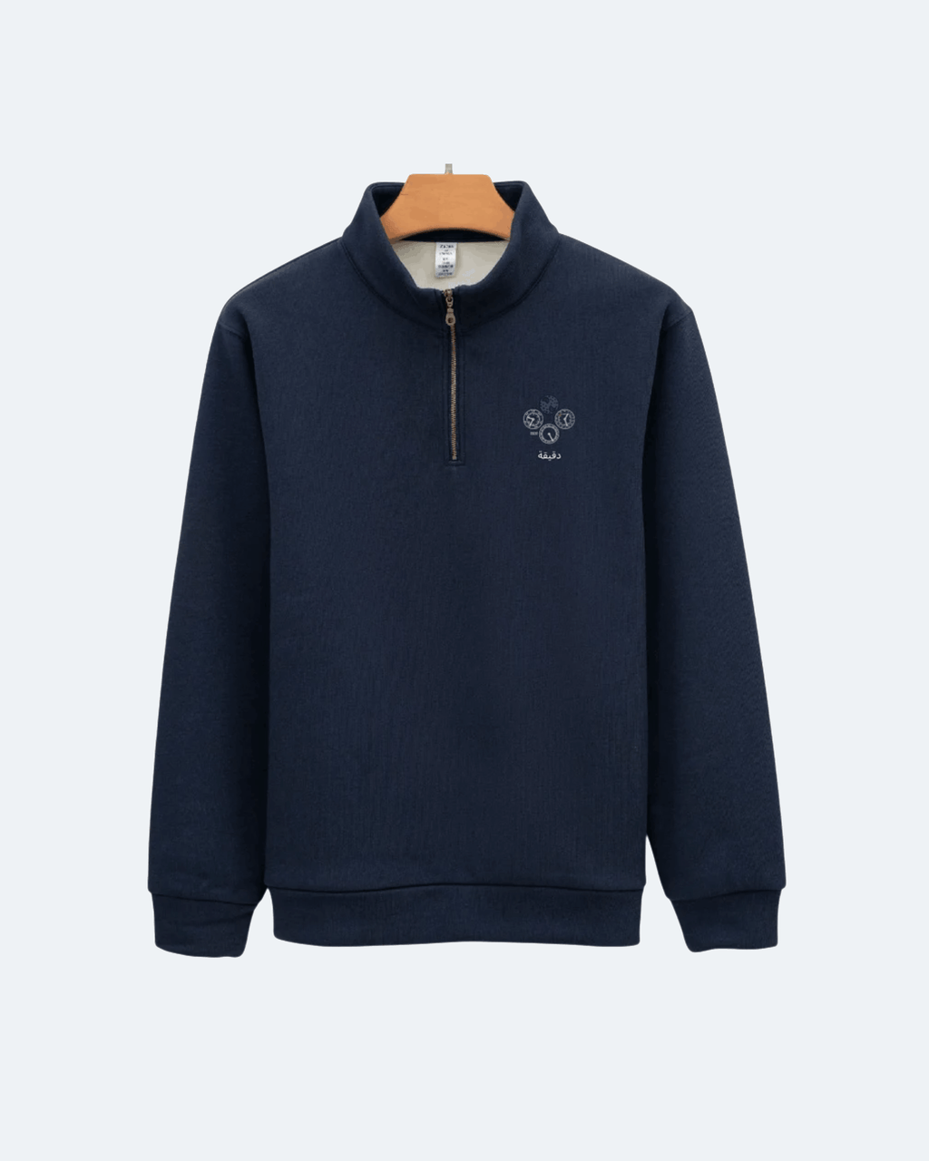 Navy blue Perpetual Flight Quarter Zip sweatshirt with a small logo on a white background