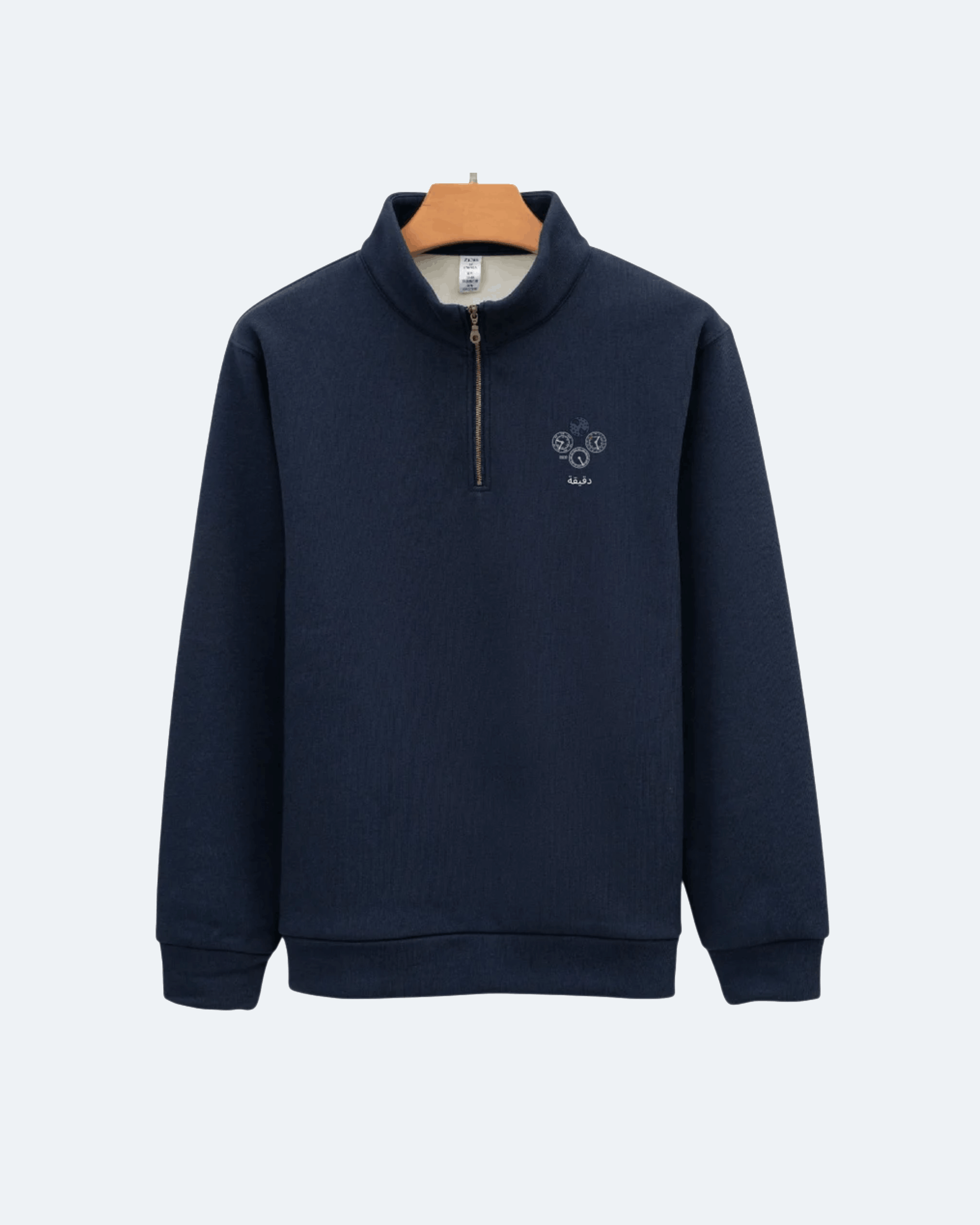 Navy blue Perpetual Flight Quarter Zip sweatshirt with a small logo on a white background