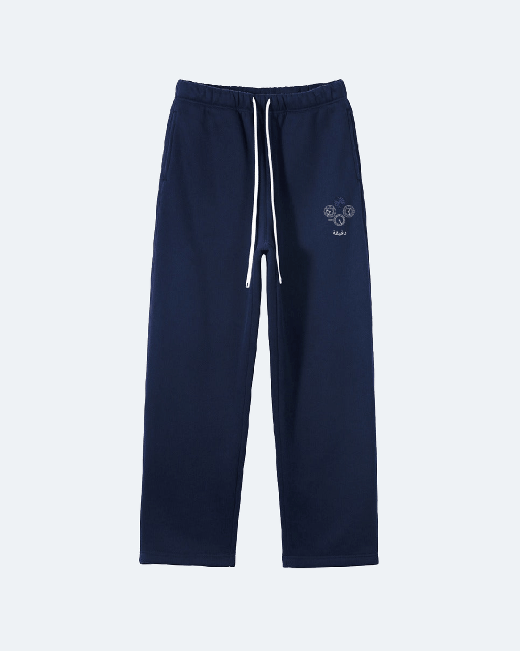 Navy blue Perpetual Flight Trackpants  sweatpants with a small logo on a white background