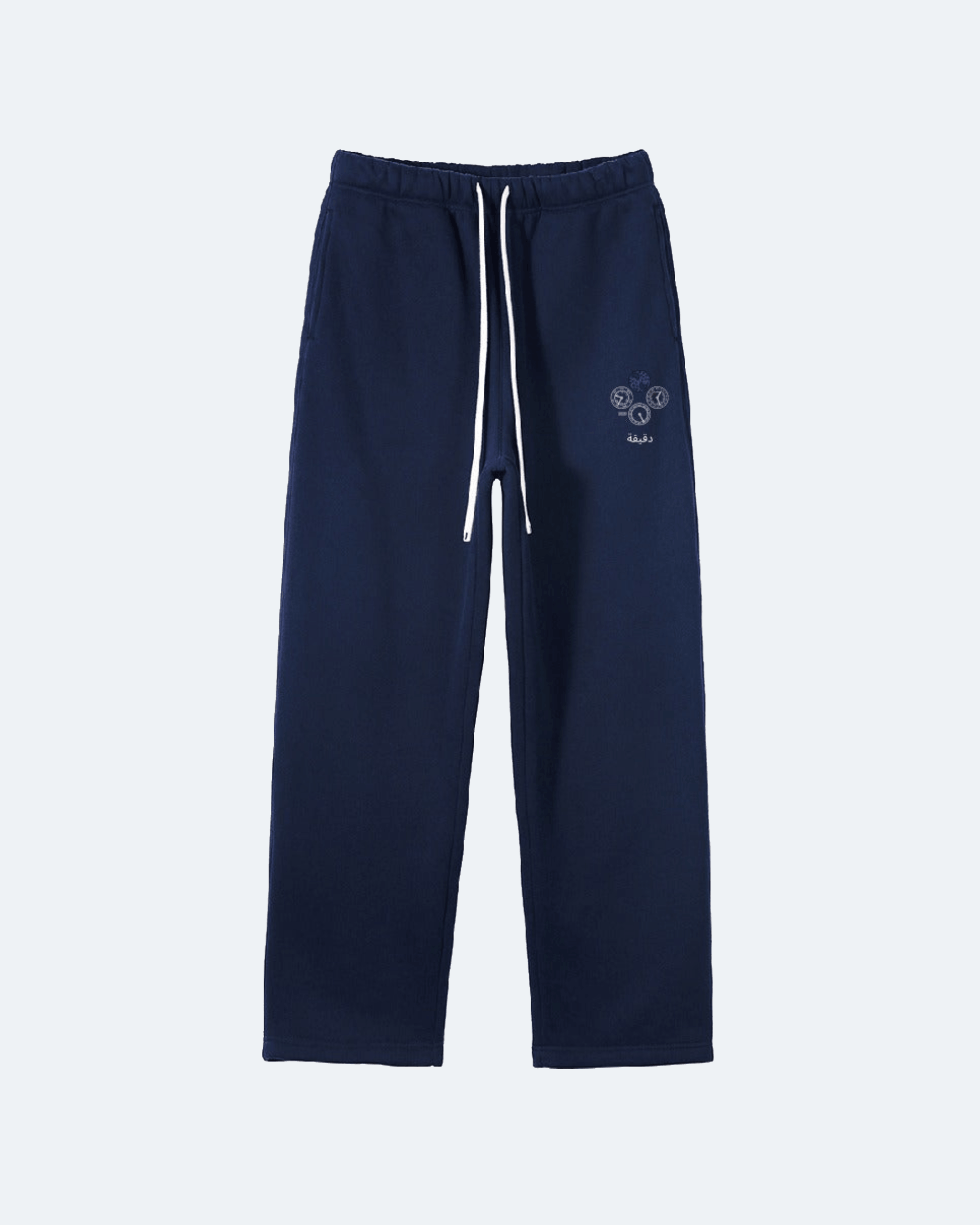Navy blue Perpetual Flight Trackpants  sweatpants with a small logo on a white background