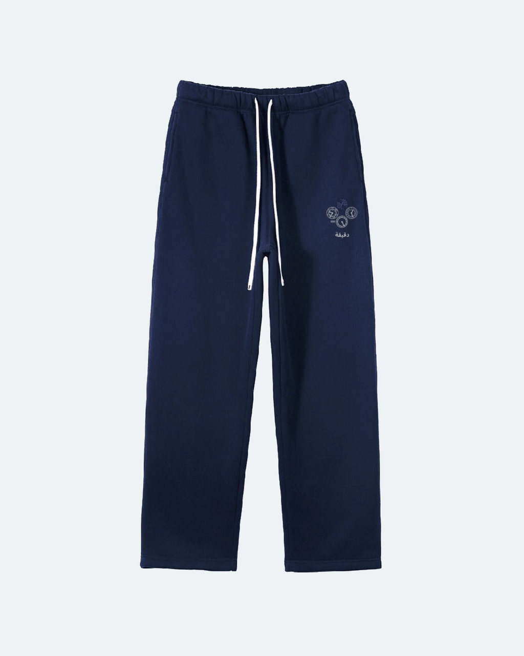 Navy blue Perpetual Flight Trackpants  sweatpants with a small logo on a white background