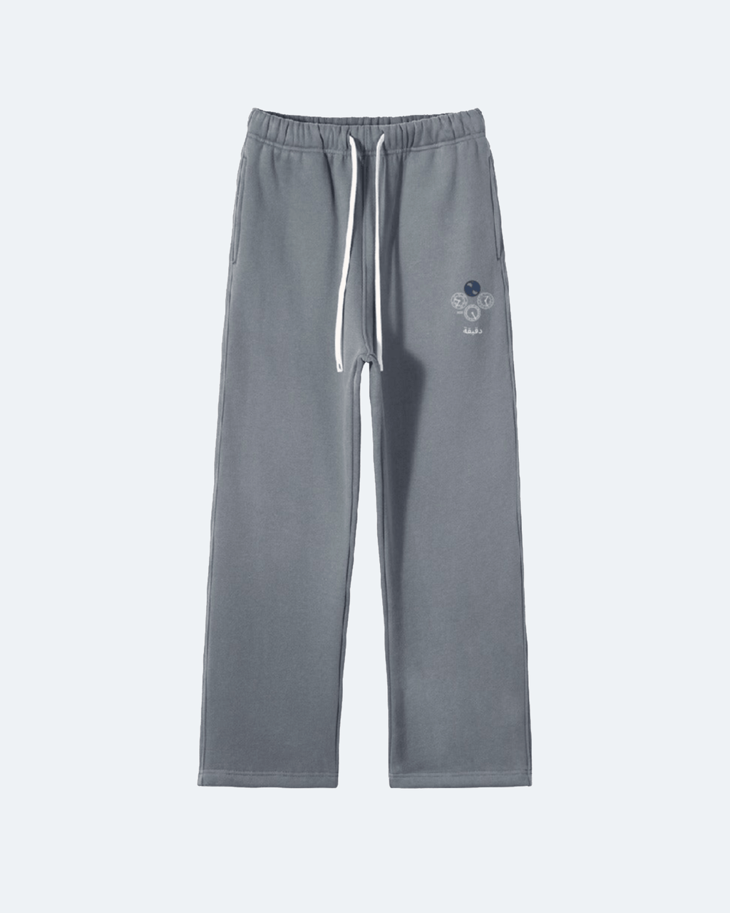 Gray Perpetual Flight Trackpants  sweatpants with a small logo on a white background