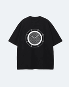 Black Royal Time T-Shirt with a white geometric design on a light gray background