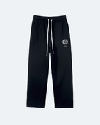 Black Royal Time Trackpants with a logo on a white background