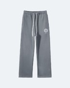 Gray Royal Time Trackpants with a small logo on a white background